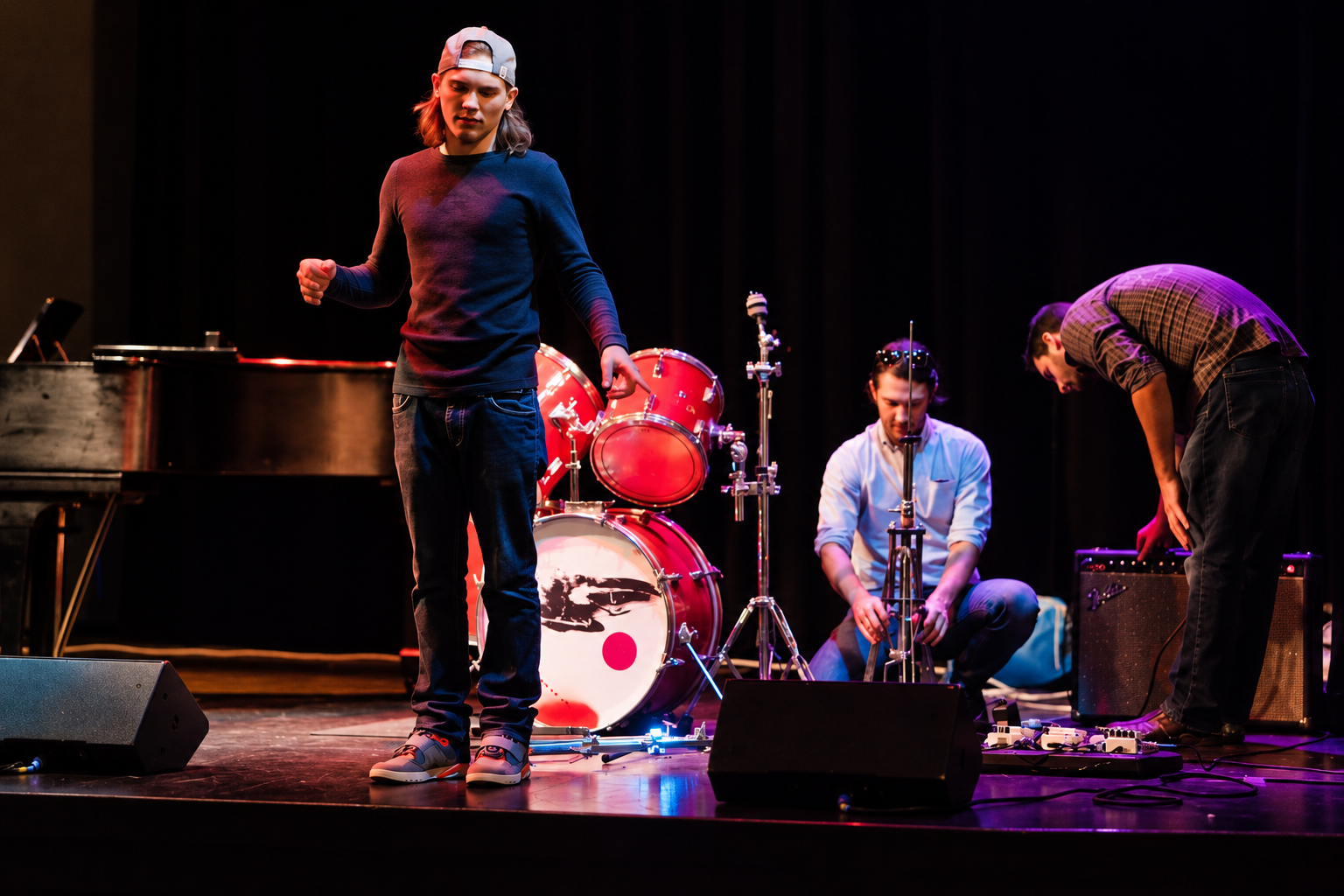 Musicians and instruments on stage · MBMS archive