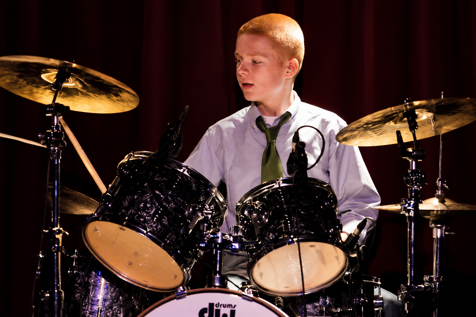 Drummer behind a drum kit · MBMS archive