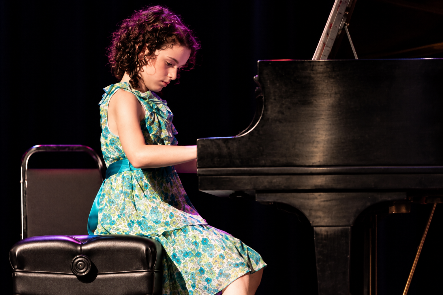 Pianist at a grand piano · MBMS archive
