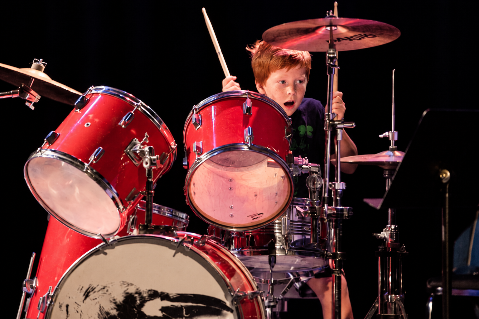 Drummer playing a drum kit · MBMS archive